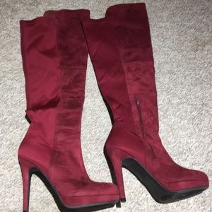 Knee high red high heel boots